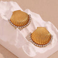 Seashell theme studs